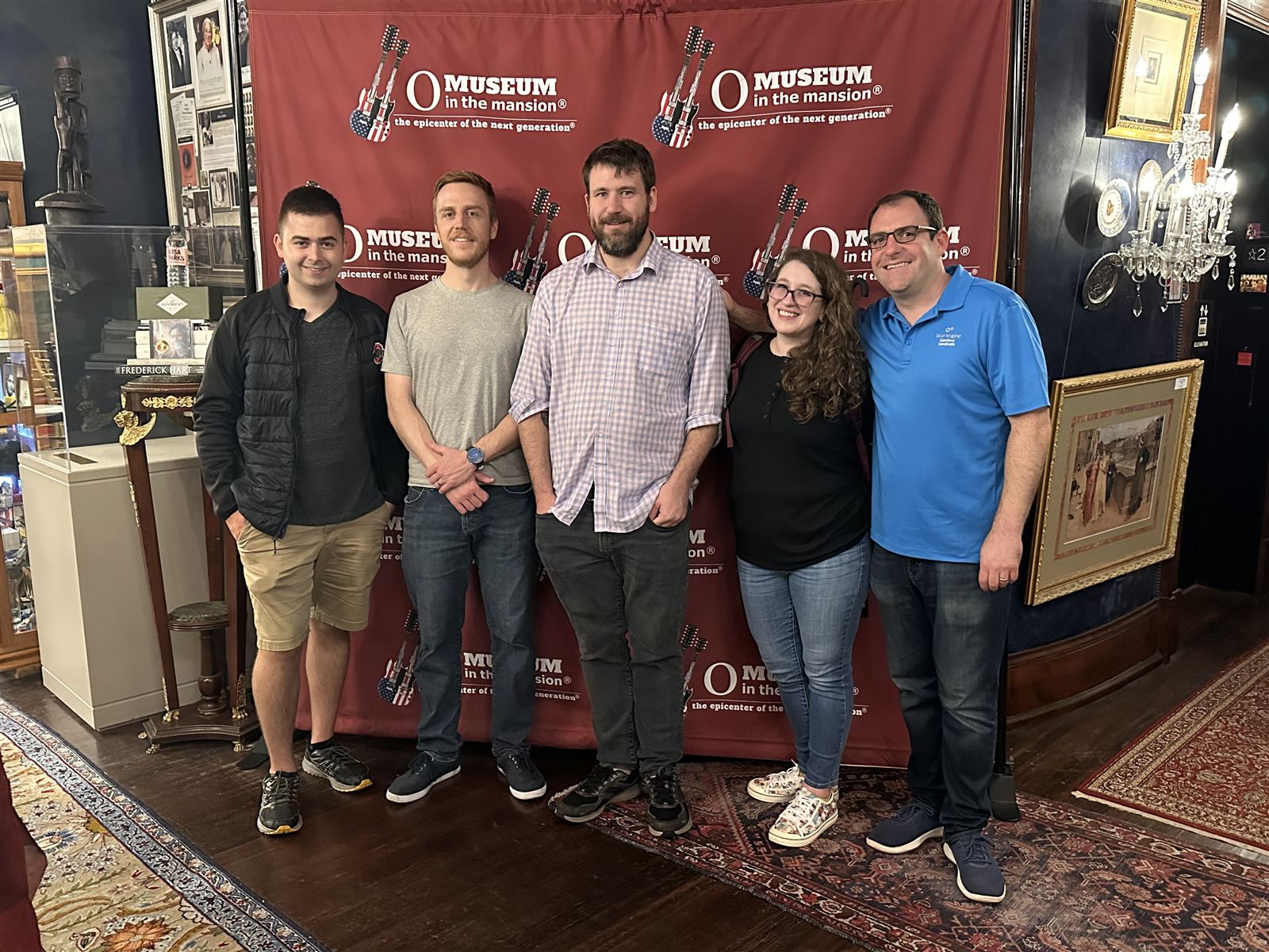 Blue Engine team photo at a museum in Washington, DC